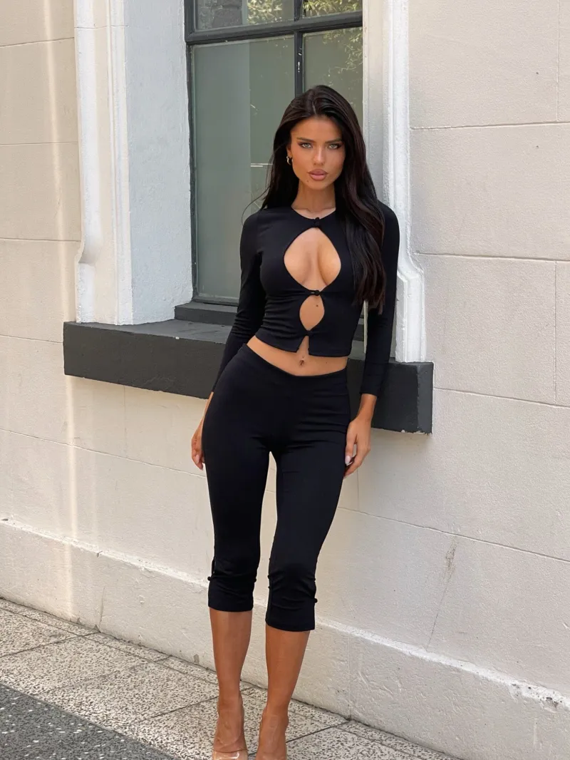 CAPRIS BLACK LONG SLEEVE STRETCH PANTS - Image 2